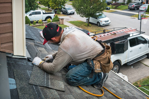 Professional Roofing technician working in Winfield, IA